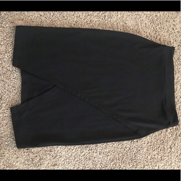 Popular Basics Dresses & Skirts - Knit knee length skirt with asymmetrical look